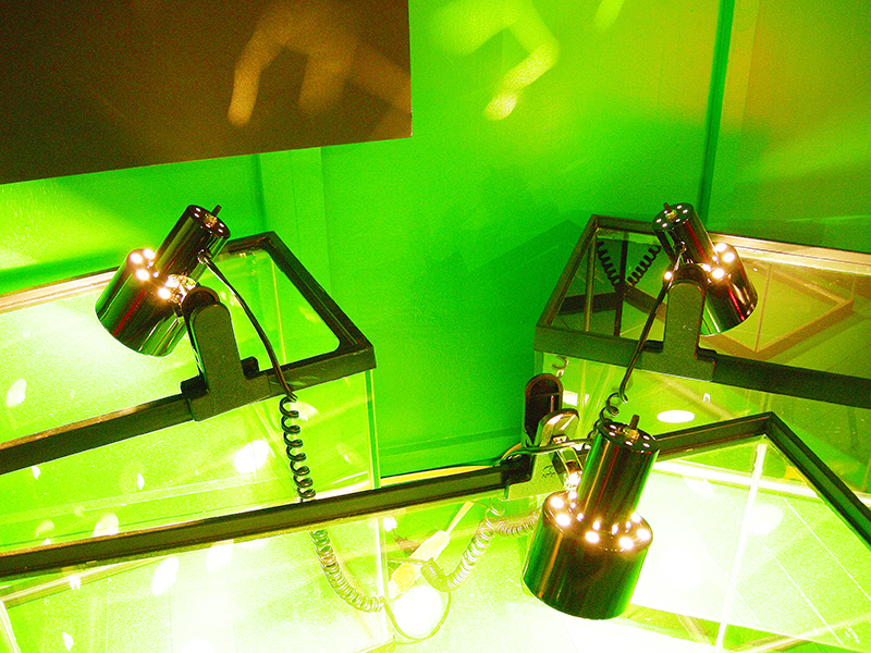 Lit fishtanks image from SET THE CONTROLS FOR THE HEART OF THE SUN, installation at WRKS DVSN, by Kennedy Telford, 2006.